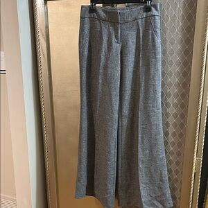 Cache dry cleaned worn once Trousers wrinkled from being packed